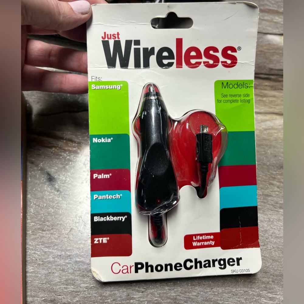 Car charger for micro USB devices.  NIB
